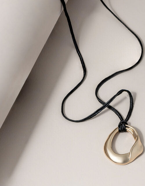 Long Sculptural Cord Necklace