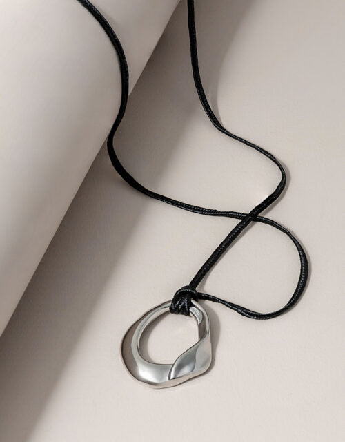 Long Sculptural Cord Necklace